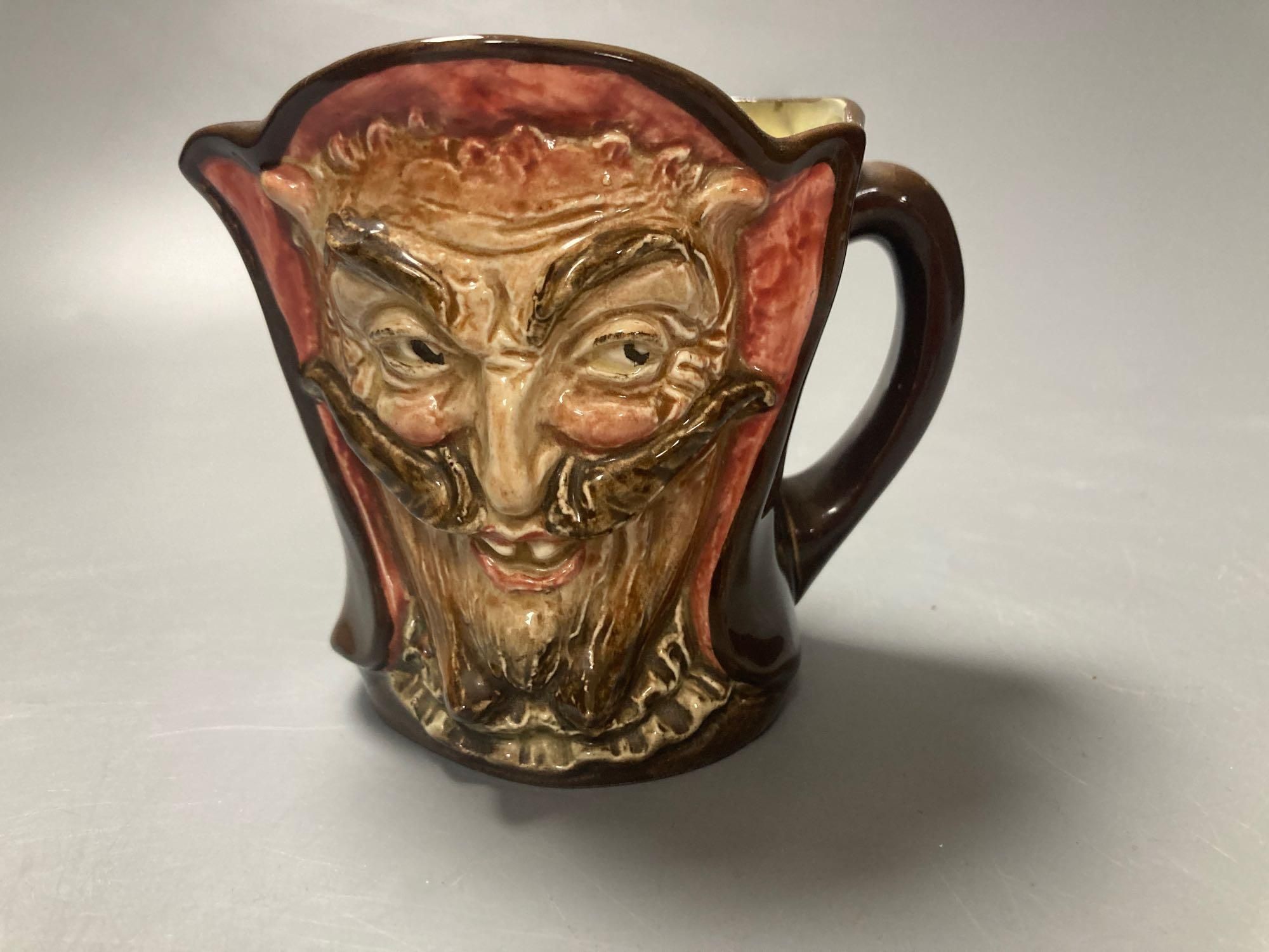 A Royal Doulton Mephistopheles medium character jug, marked on bottom When the devil was sick, the devil a saint would be, when the de